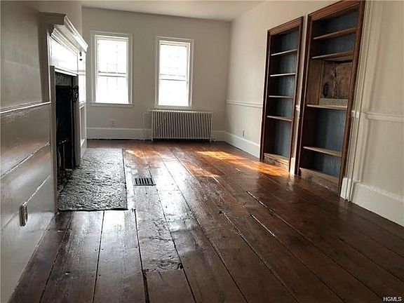 Breakfast room with door to side open porch.