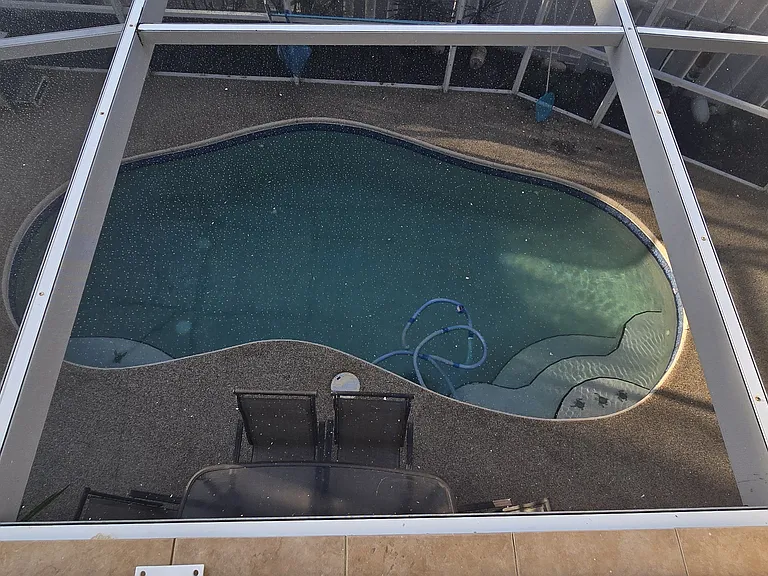 Large screened in lanai with pool