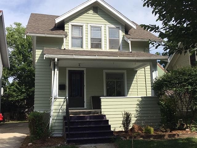 Front of house facing Rutledge Street. Large front porch.