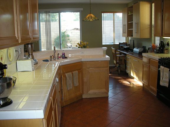Spacious Kitchen opens to dining area and built in office