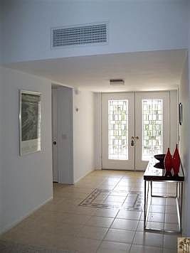 Double door entry with ample natural lighting.