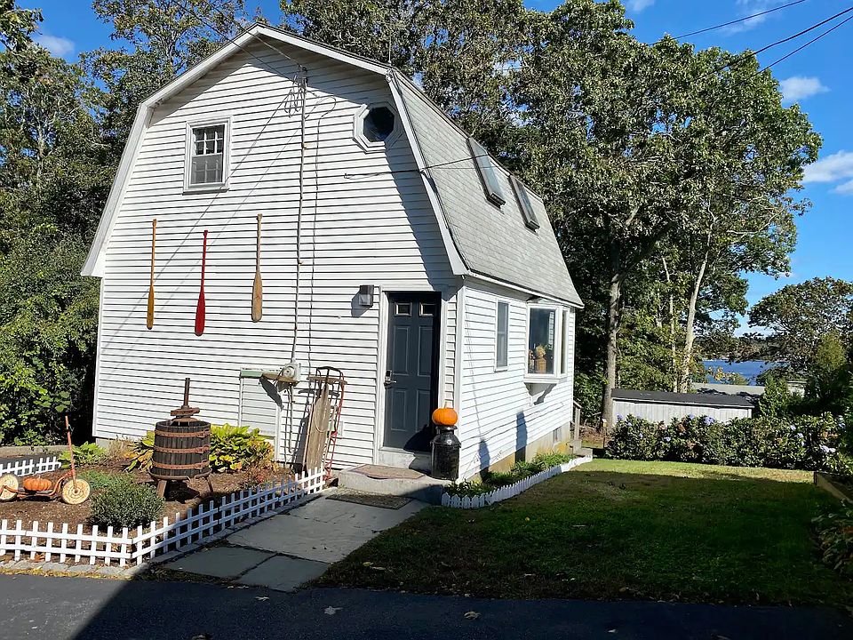Cottage view from outside. Assigned parking to the left of the cottage.