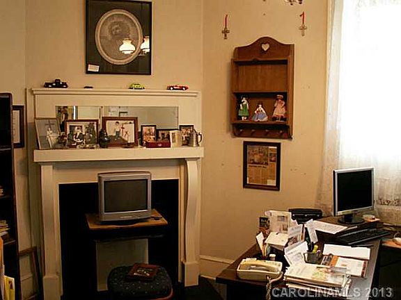 Office with fireplace