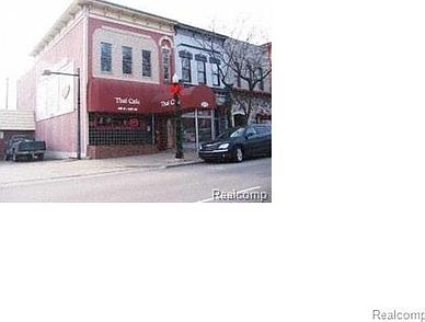 1st image of 215 E Grand River Ave