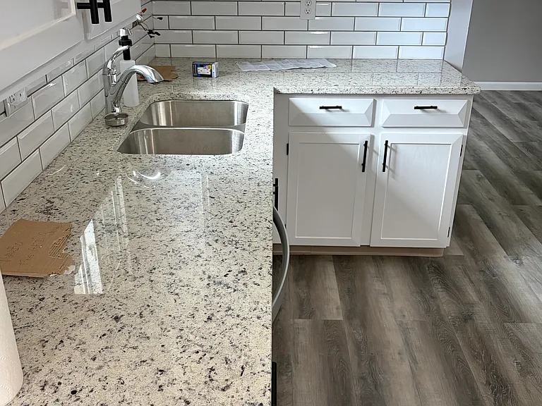 New Granite countertops and backsplash.