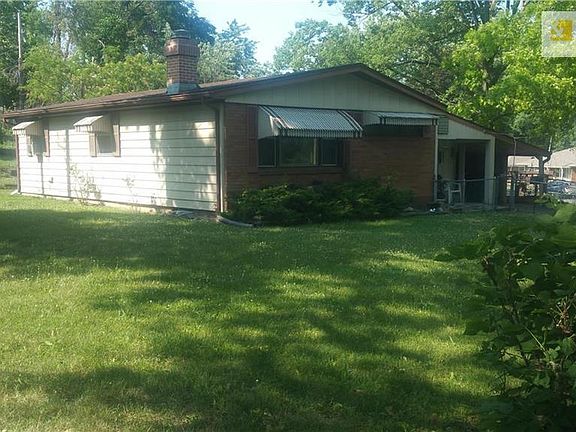 Side view of house and yard