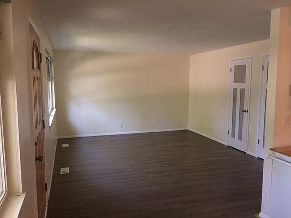 Living room with storage closet