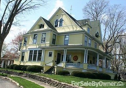 Victorian farmhouse with wrap around front porch