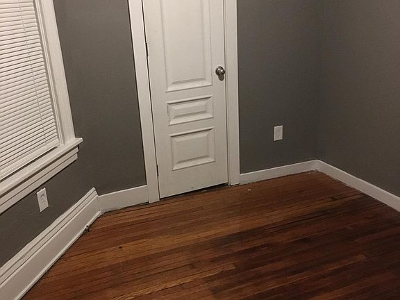 A deep closet in bedroom 1