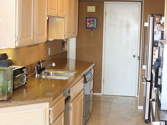 Upgraded travertine floors, granite counters