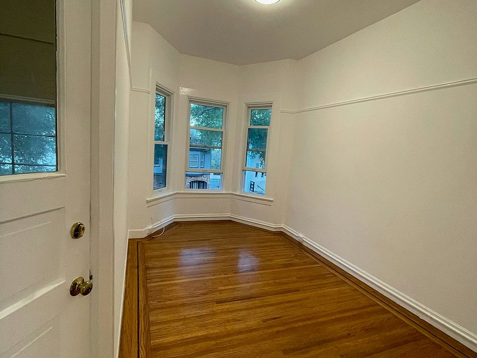 Entryway and view of Folsom at Precita, just up the hill. This room is commonly used at a living room or office space.