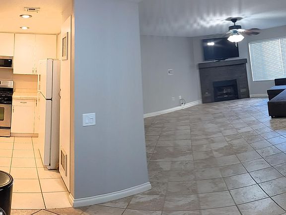 Living Room with dining area, leading to kitchen
