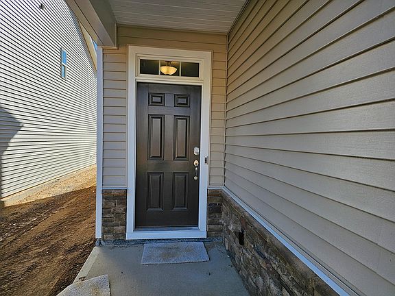 Front entrance with key pad lock and ring door bell