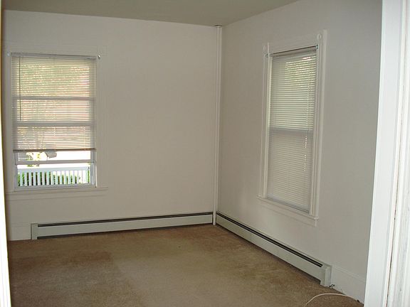 One Bedroom with closet and nice size windows bringing in natural light.