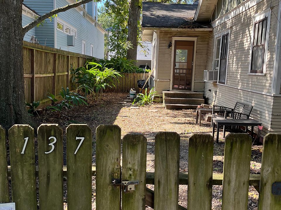 Private side yard and entrance to your apartment