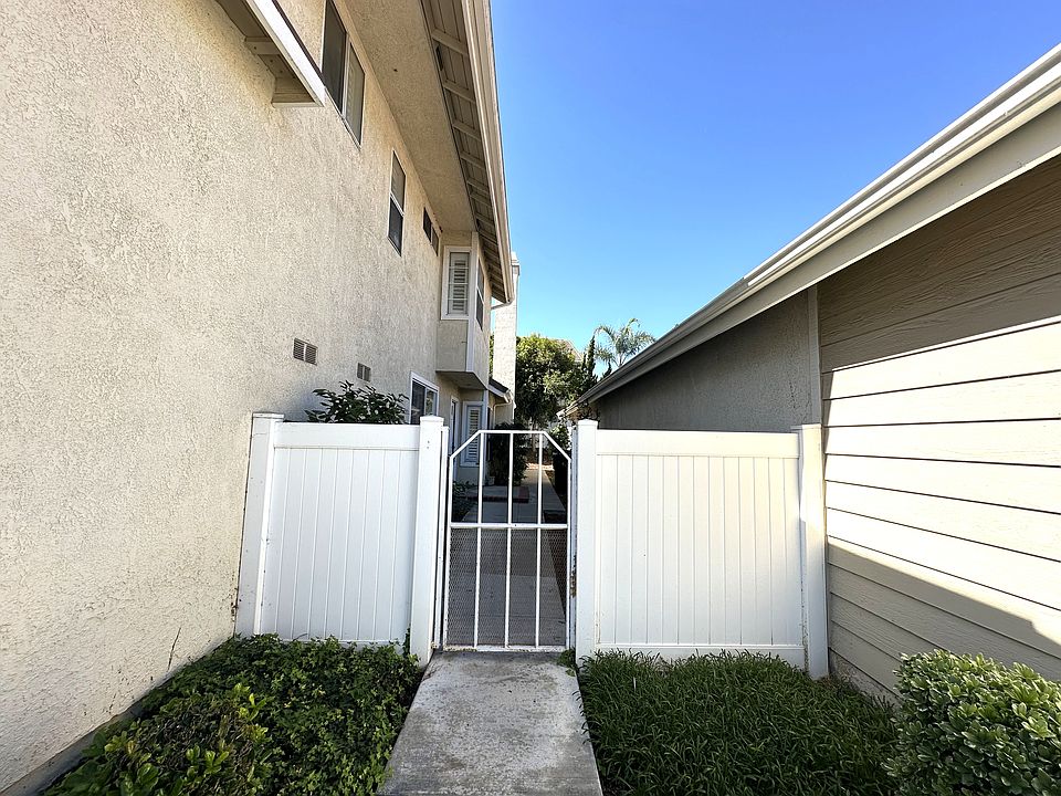 Gate entrance to front door and side yard.