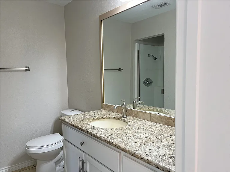 One of two bathrooms on the second floor. This one has a walk-in shower.