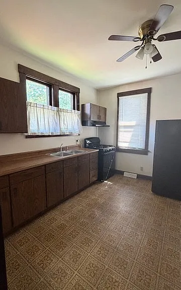 Kitchen upon exiting the bedroom.