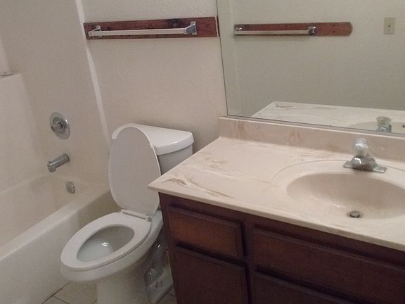 One of 2 identical bathrooms