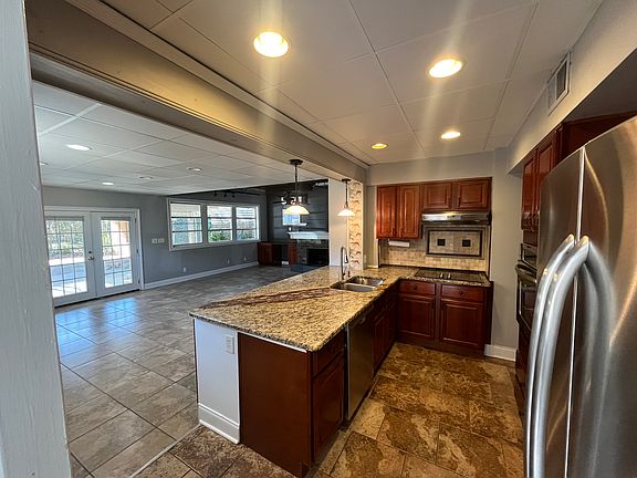 Kitchen opens to den