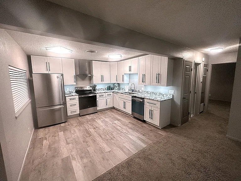 Kitchen - Hallway
Left - Hot water heater closet, Bathroom, HVAC closet
Straight - Bedroom 2 and Laundry room
Right - Master Bedroom