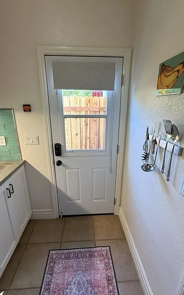 Front door leads to kitchen