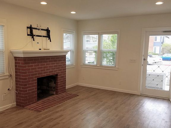 Living room opens to front porch