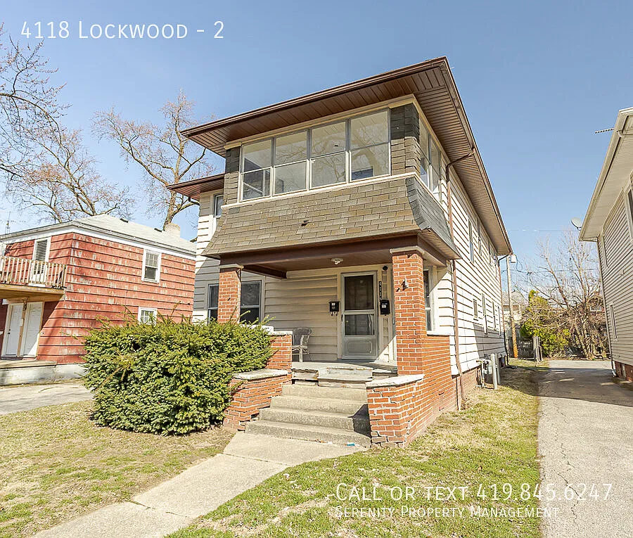 Fall in Love with Your New Home! Two Bedroom UPPR Unit In West Toledo! — Photo 1