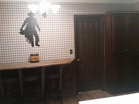 Other side of kitchen w/bar