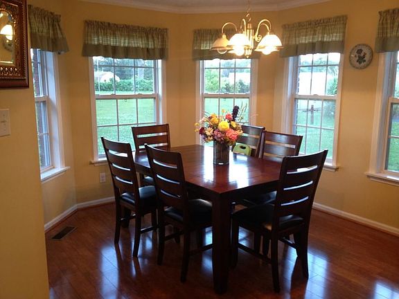 Window-surrounded dining area