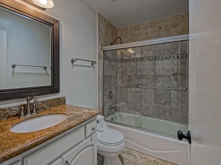 7148 Island Village Dr — Photo 30