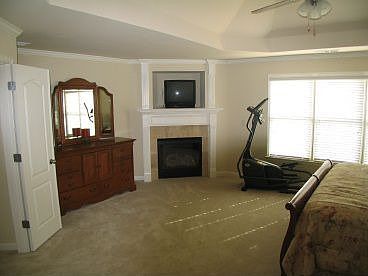 Romantic master bedroom fireplace.