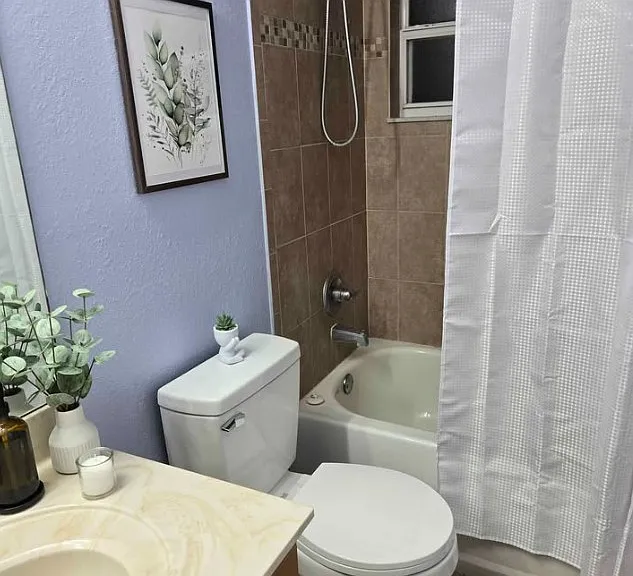 The private bathroom is completely furnished and move-in ready, including towels, toilet paper, and a welcome travel care package with toothpaste and essential toiletries for your convenience.