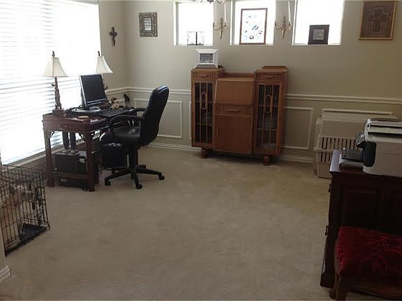 Formal dining room being used as a study