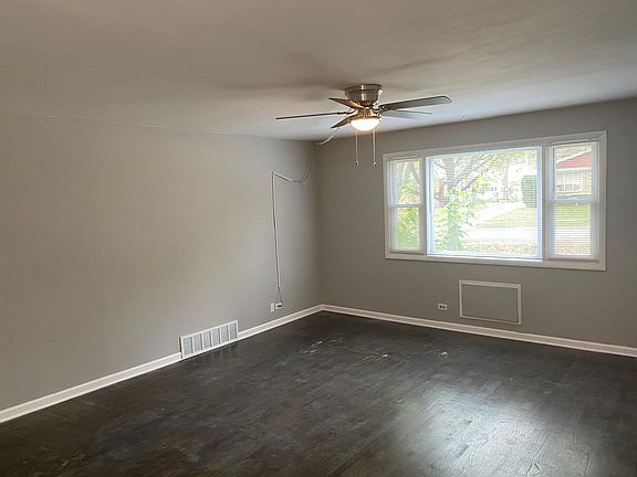 Brightly lit, wide open family room