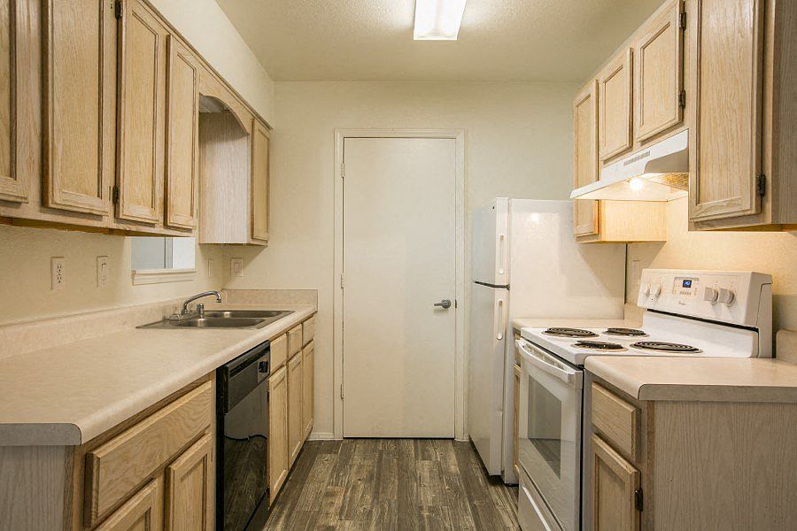 Kitchen with rich light wood cabinetry
