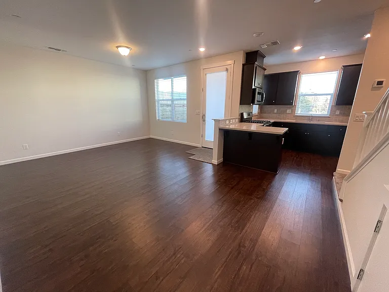 Open concept living room, dining room and kitchen