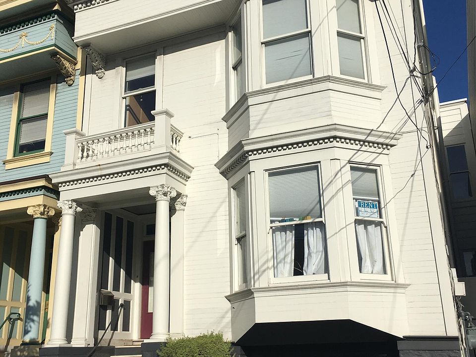 Exterior of building. No interior photos available as tenants still occupy the unit. Open house October 19 from 1pm to 2pm