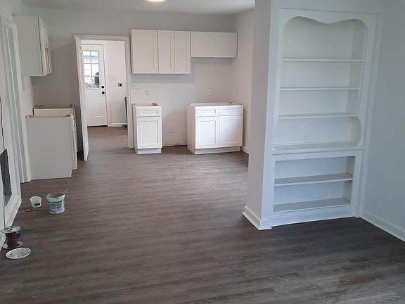 Original built in bookcase and easy to care for flooring.