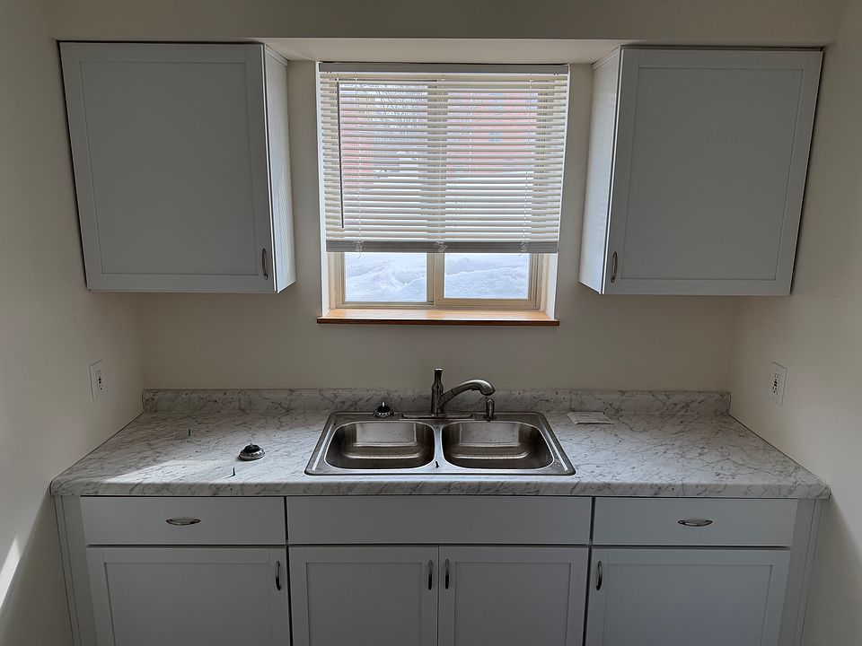 Fully renovated kitchen with new cabinets and countertops