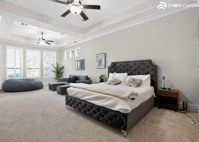Master bedroom with cozy seating