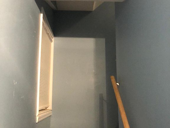 Stairs with new window on landing