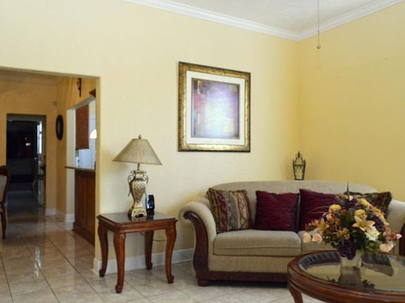 Spacious, open floor plan. View from the Living Room down the hall to the Kitchen & Dining Room.