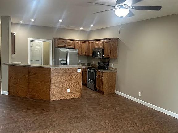 View across living area to kitchen