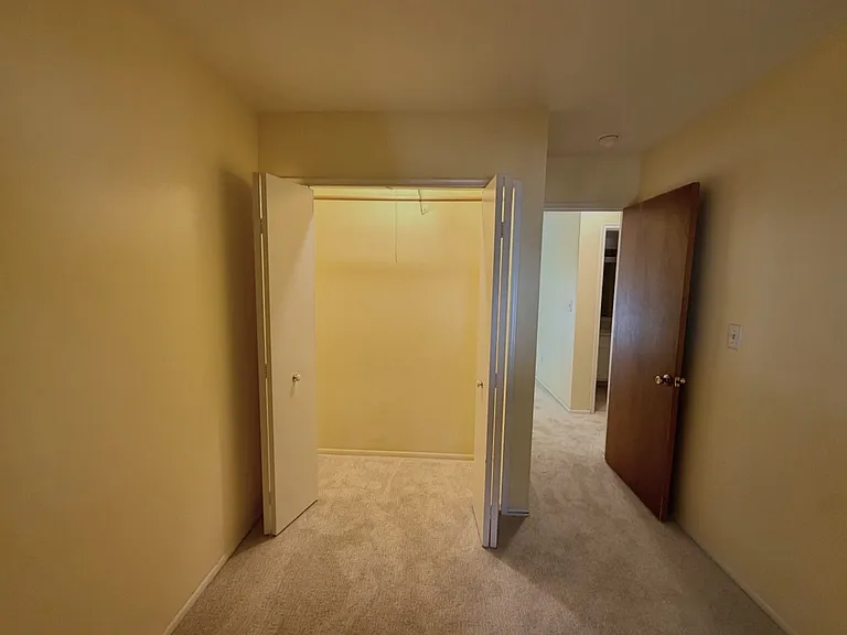 Second bedroom with new carpet in 2026