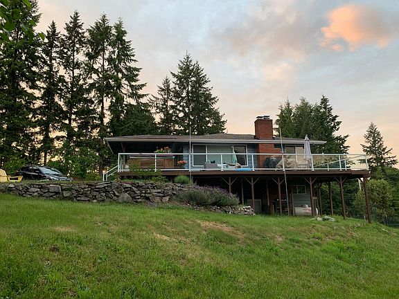 from property line lower hill to deck side of the house