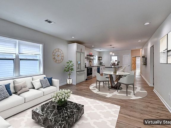 View of living room and kitchen