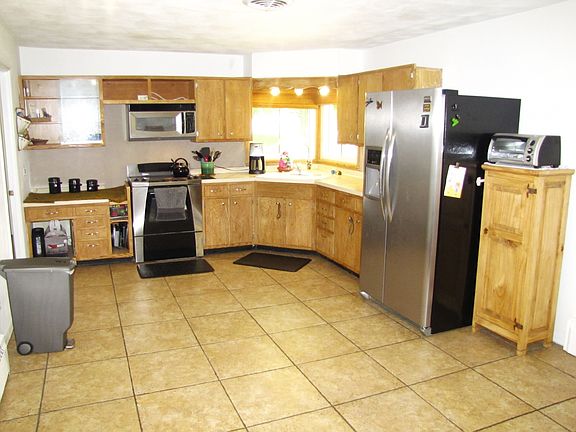 Eat in kitchen with appliances