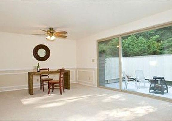 Alternate view of family room/dining room with view to very private back patio