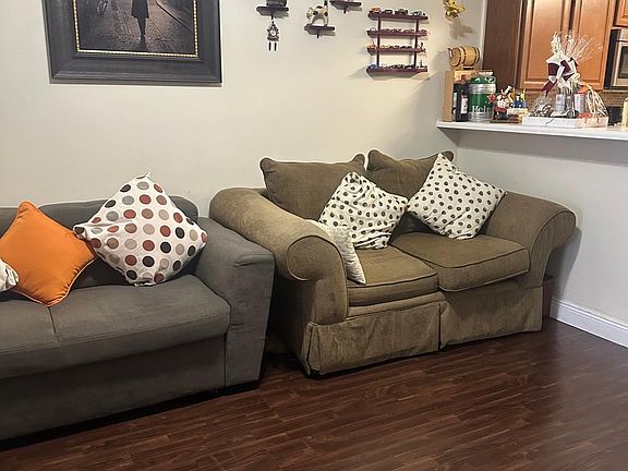 Living room, funitures belong to the current tenant. They are moving out at August 20th.